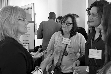 women talking at the LUNG FORCE Expo
